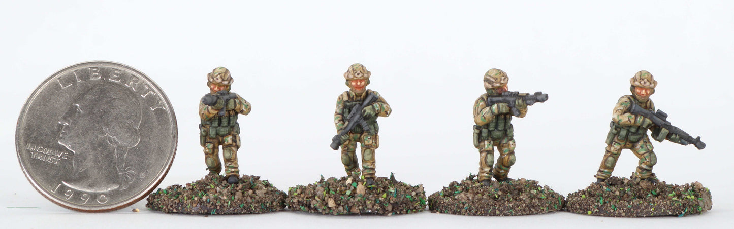 15mm modern special forces fighter miniatures in camouflage with weapons, displayed next to a 1990 Liberty quarter for scale