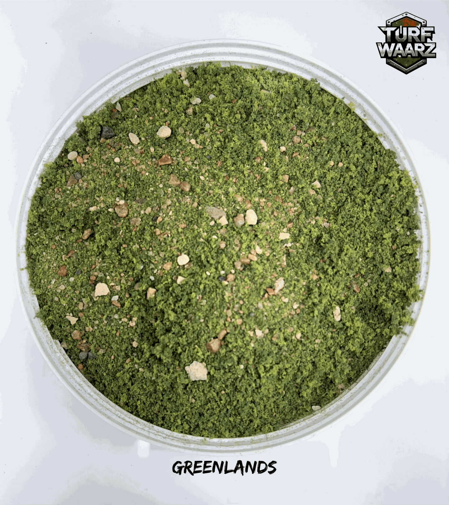 Turf Waarz Greenlands Wargame Turf with mixed gravels and sands in a plastic container for tabletop and miniature terrain modeling.