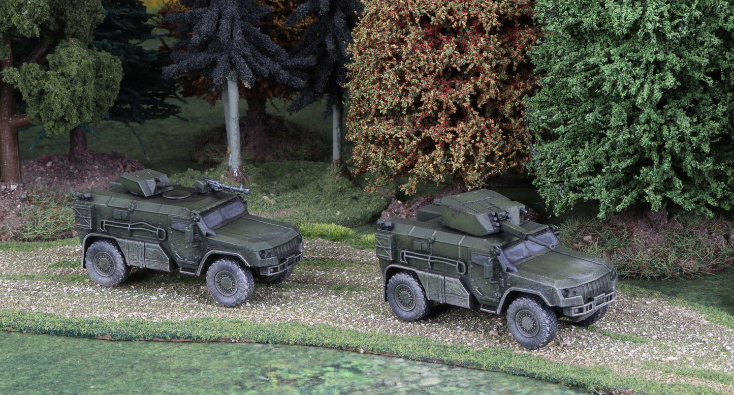15mm scale model of modern Russian K-4386 Typhoon vehicles with two turret options in a forest diorama