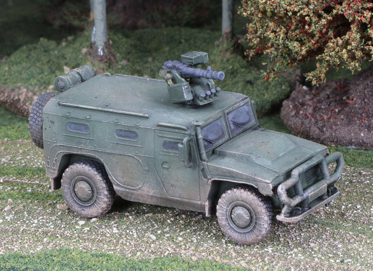 15mm scale model of a modern Russian GAZ Tiger-M military vehicle in green camouflage on a diorama terrain