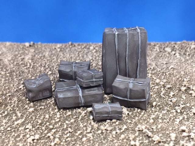 Set of seven resin casted 28mm cardboard boxes for scale modeling or miniature displays