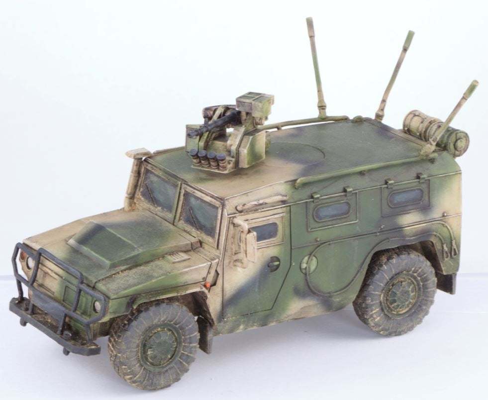 28mm scale model of Gaz Tiger M military vehicle with mounted turret and camouflage paint