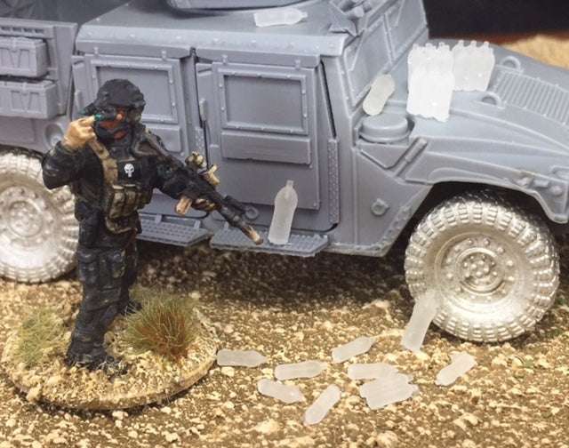 28mm water bottle set with various sizes including individual bottles, 1 liter bottles, and six-pack groups displayed near a military vehicle model and soldier figure
