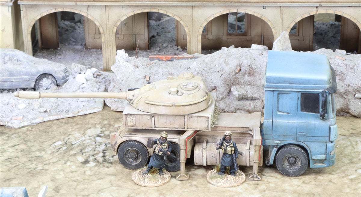 1/50 scale 28mm Semi truck model with T-55 turret mounted on bed in desert diorama setting