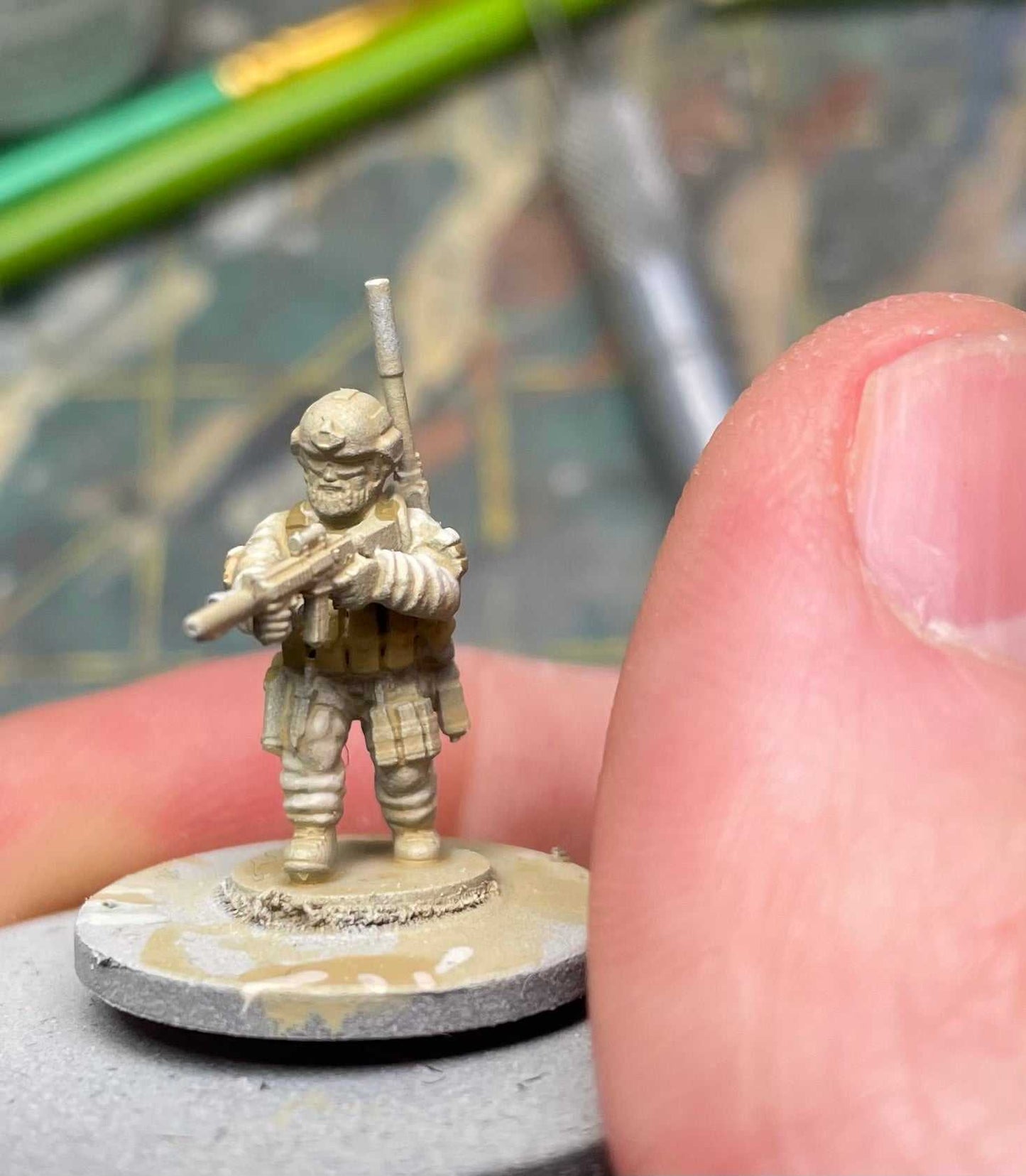 15mm resin 3D printed miniature of a modern US Navy SEAL from Ramadi 2006, unpainted and detailed with tactical gear and weaponry
