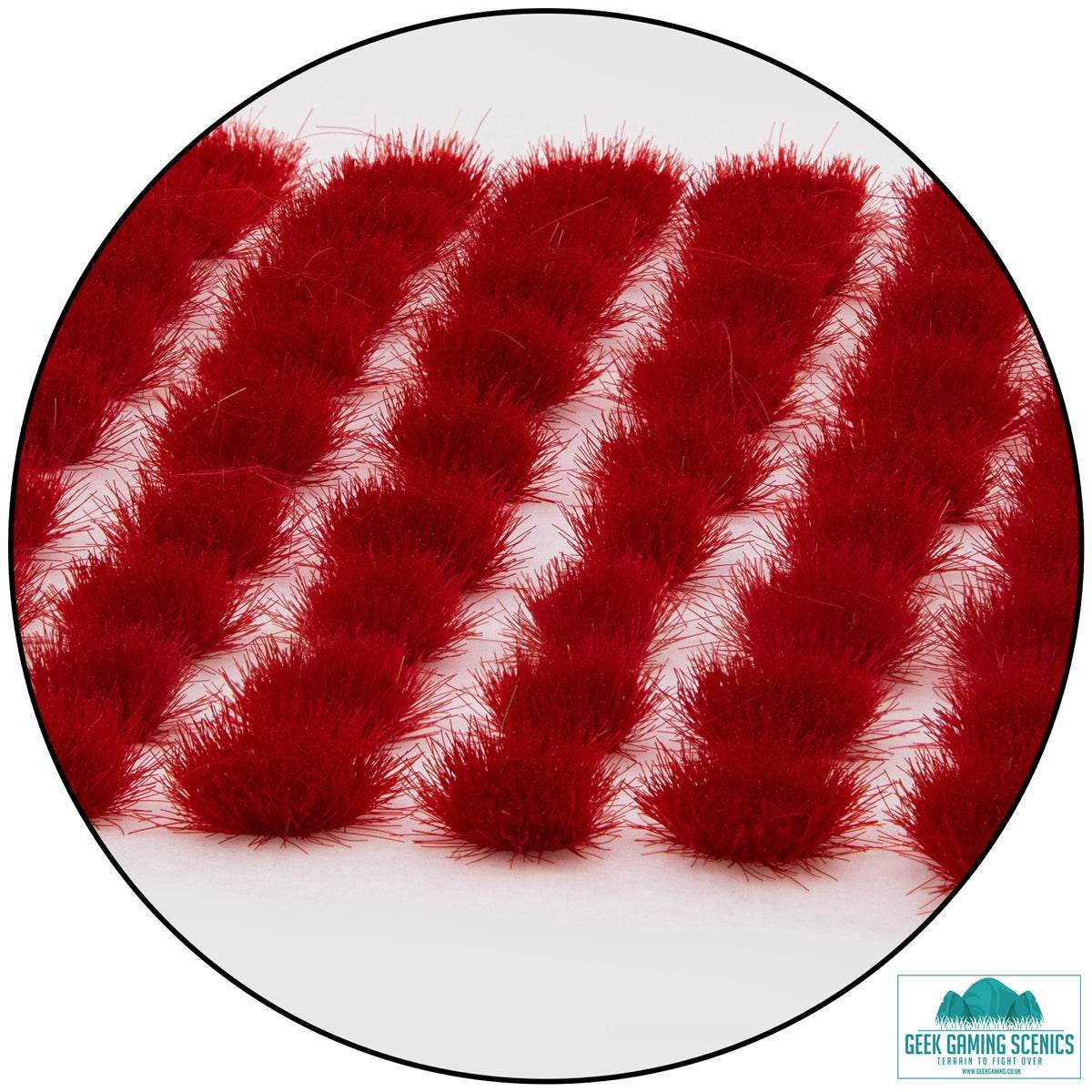 Red 6mm self adhesive static grass tufts arranged in rows for model landscaping and diorama detailing