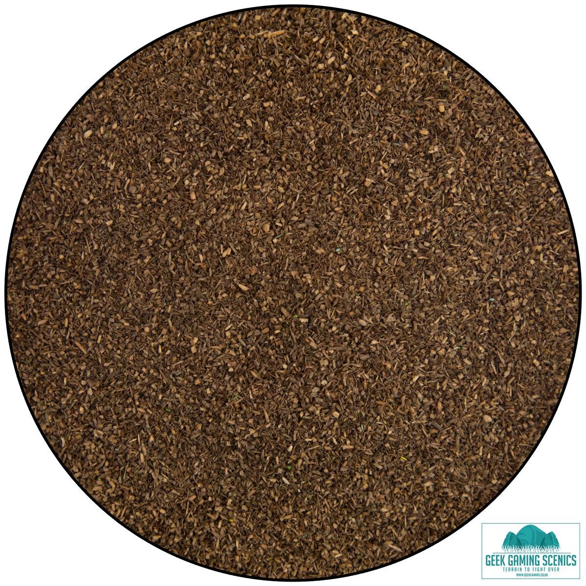 Close-up of premium brown dyed sawdust scatter for realistic ground cover in modeling and dioramas from Luke's Aps Sawdust scatter range