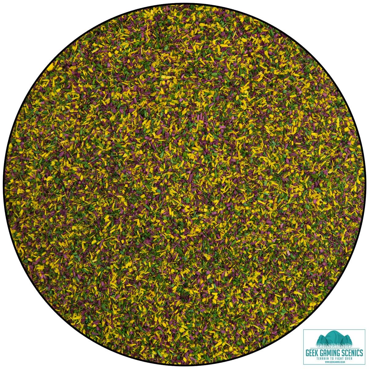Lukes Aps Scatter premium dyed sawdust in green, yellow, and purple for wargaming and model scenery ground cover.