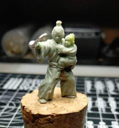 28mm metal miniature of a Samurai holding his son from Warring Clans Father And Son collection