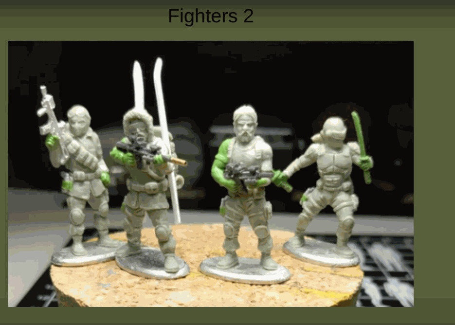 28mm Fighters set of four unpainted miniature figures holding weapons and swords on a display base