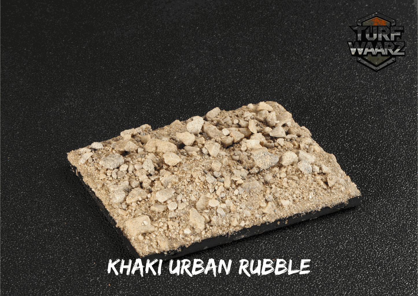 Turf Waarz Khaki Urban Rubble miniature wargame terrain scatter with khaki rubble and gravel texture on a rectangular base