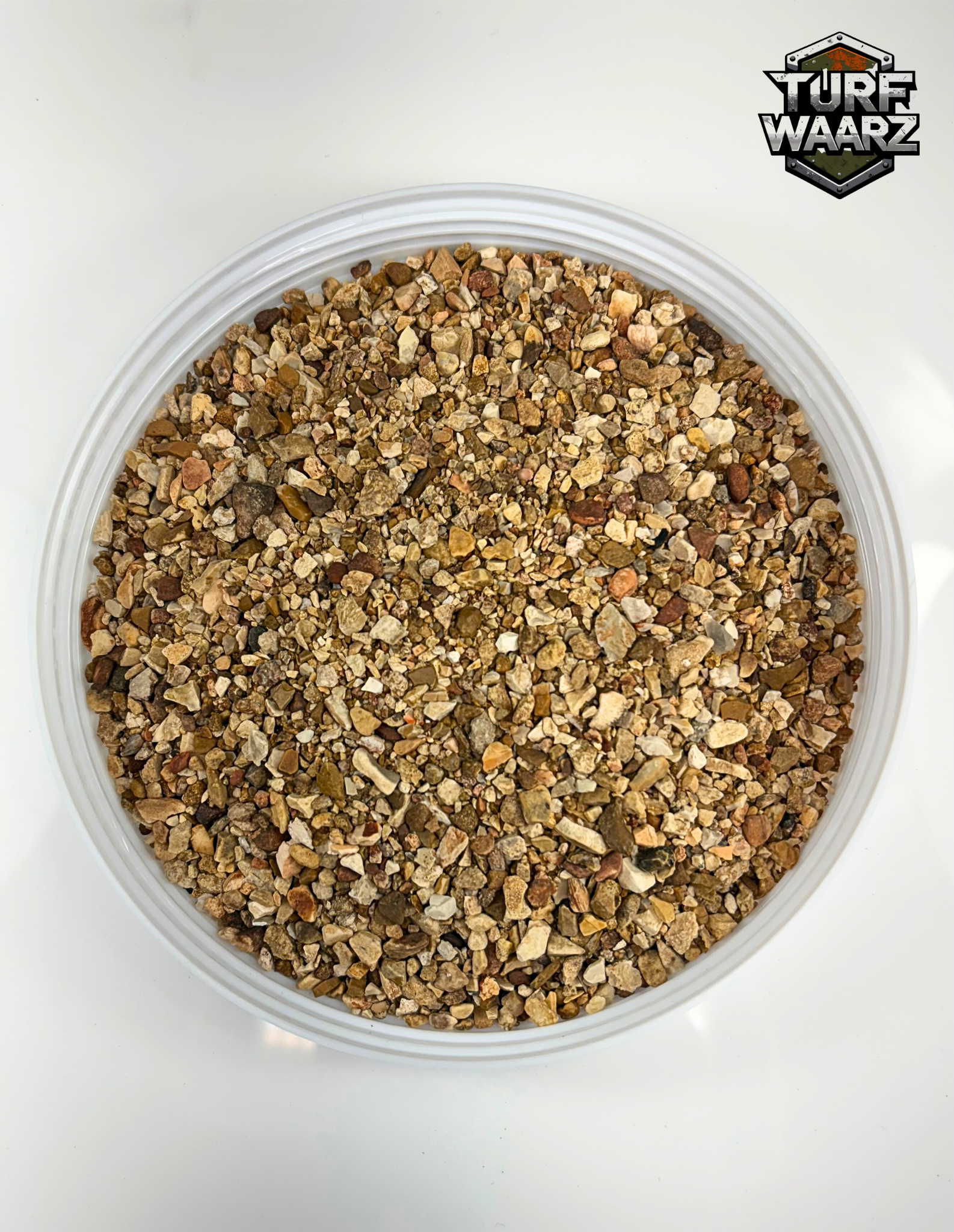 Container of Desert Rock Wargame Terrain gravel and sand mix for tabletop and miniature modeling.