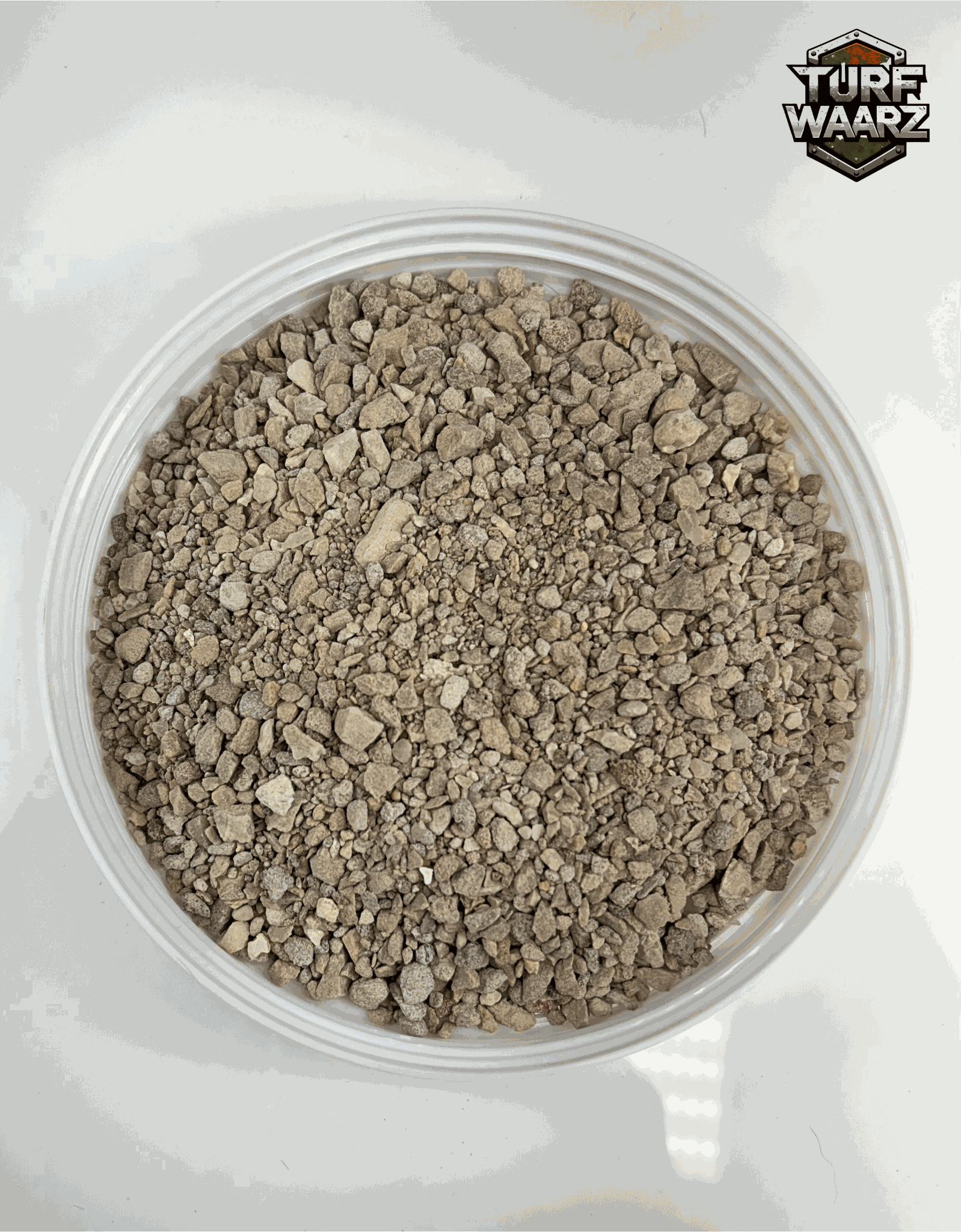 Khaki Stones Wargame Terrain container filled with mixed gravels and sands for miniature modeling.