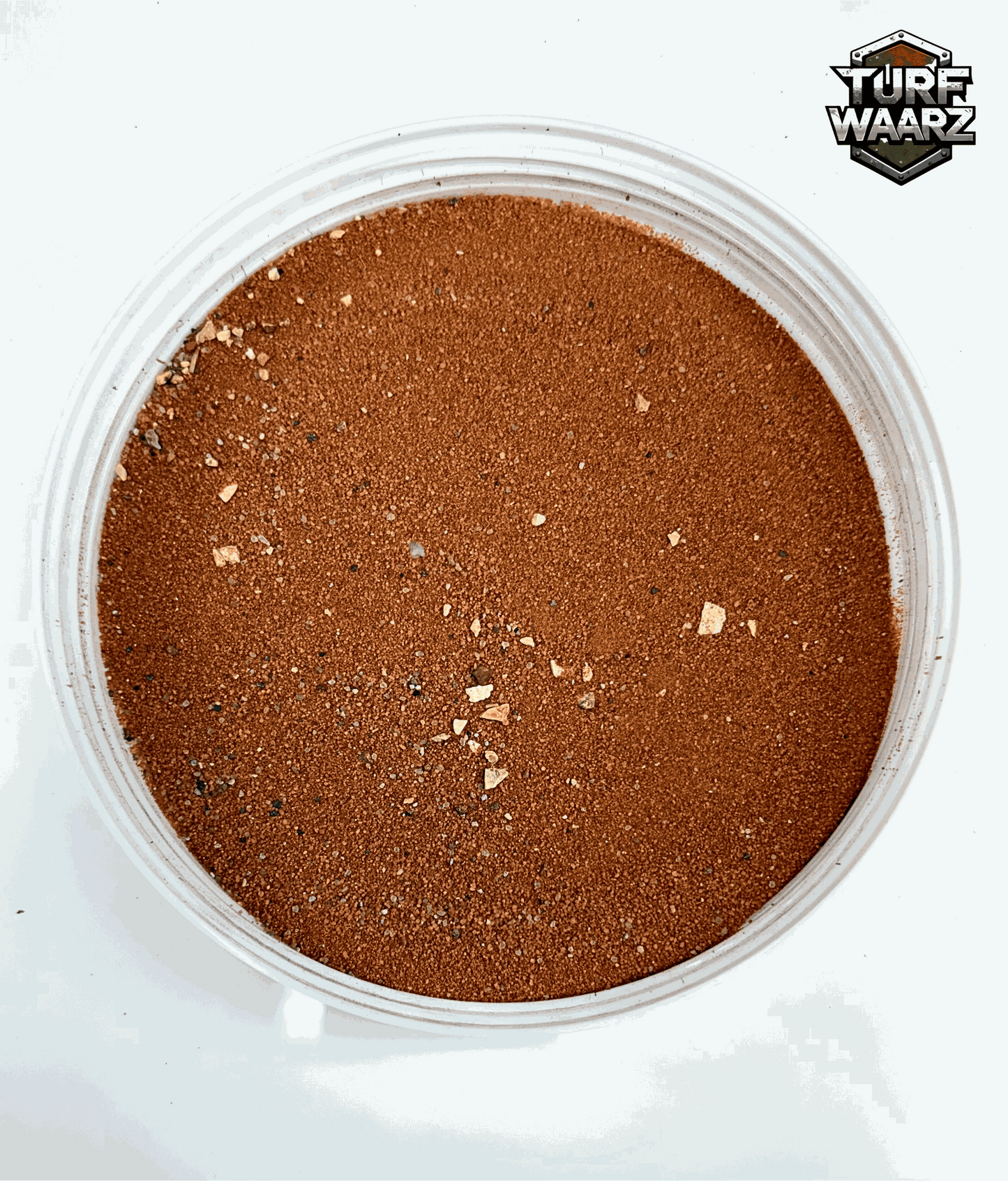 Turf Waarz Red Planet Turf in clear plastic container showing fine red and brown terrain materials for modeling and wargames