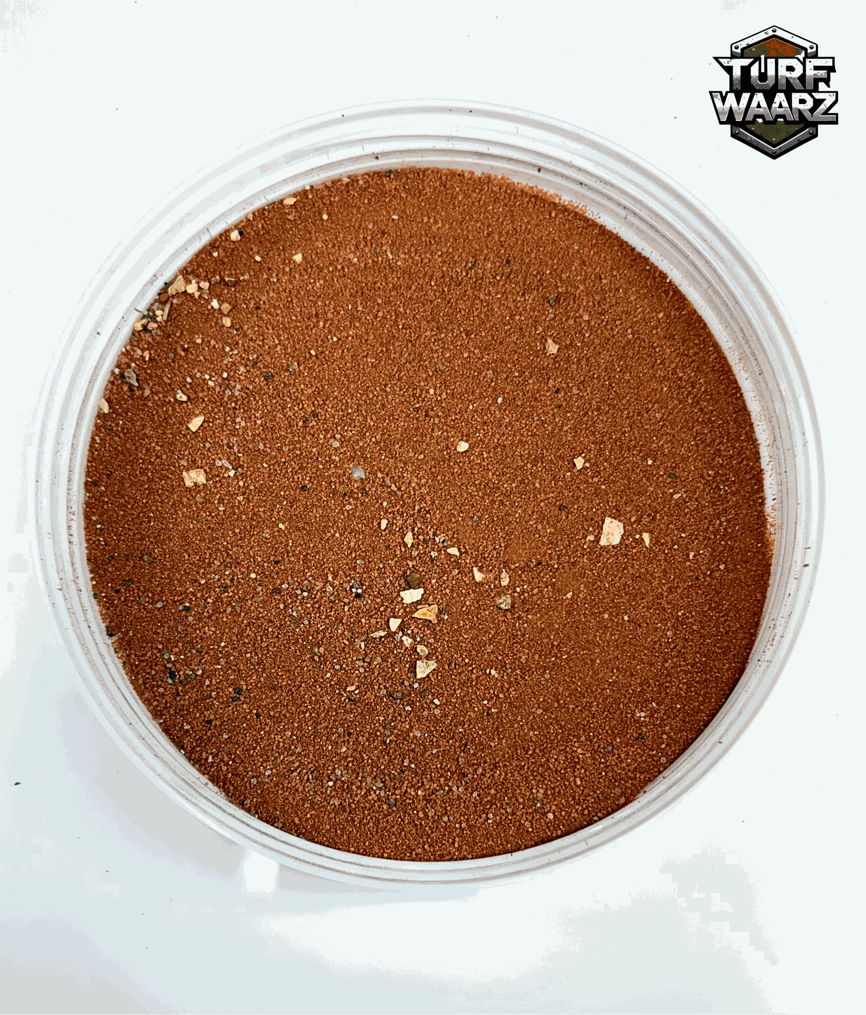 Turf Waarz Red Planet Turf in clear plastic container showing fine red and brown terrain materials for modeling and wargames