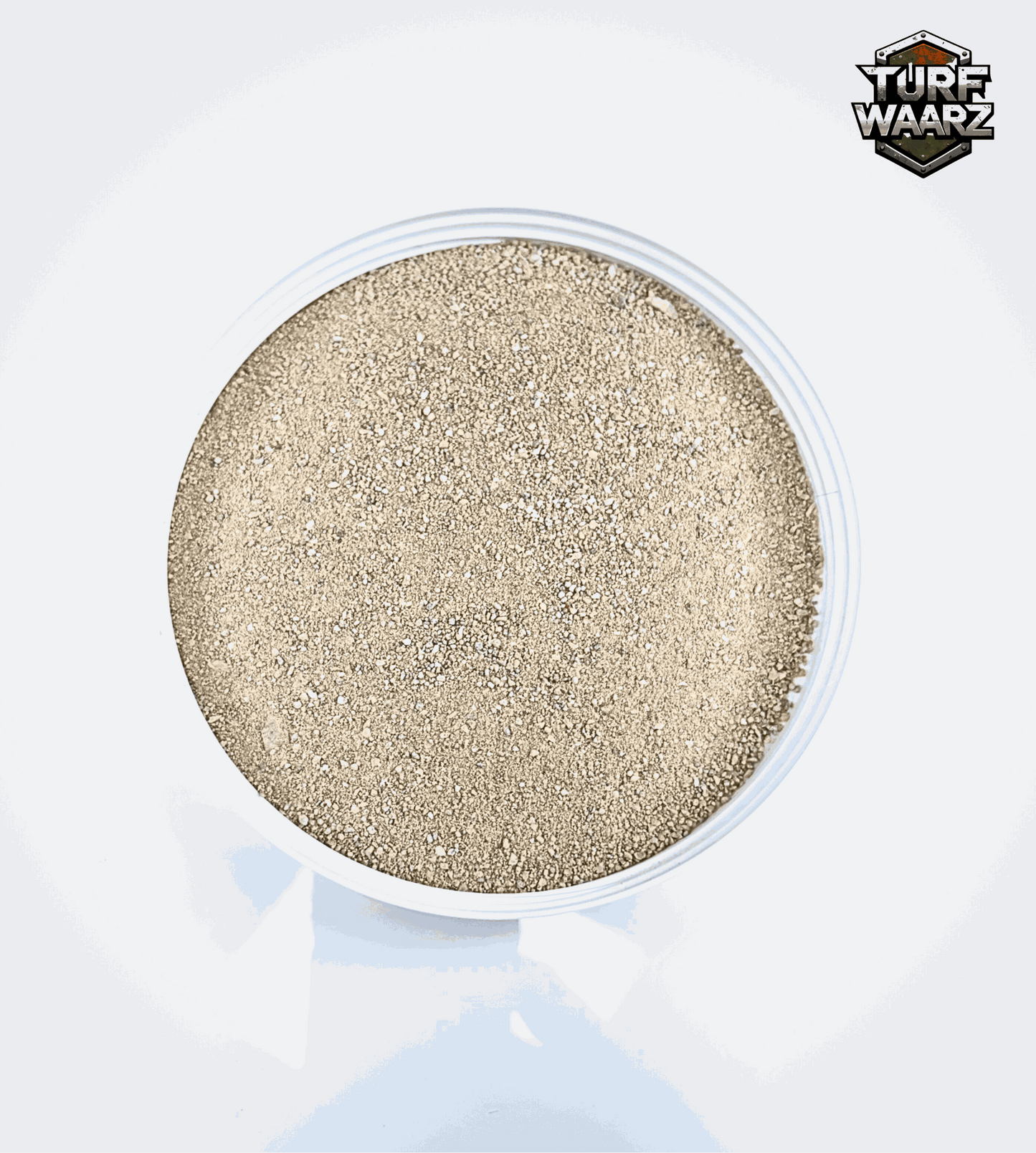 Khaki Dust Debris wargame terrain material in plastic container for realistic Middle Eastern building dust effects.