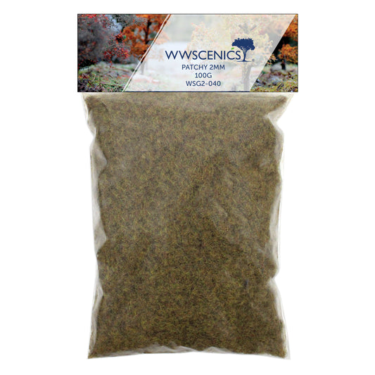WWScenics 2mm Patchy Static Grass 100g pack with fine 2mm fibers in a multi-tone blend of green and brown for realistic miniature basing and scenic variation
