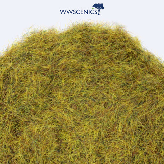 WWScenics 4mm Wild Meadow Static Grass 50g pack showing fine, natural mix of greens, tans, and earthy tones for realistic miniature wargaming, diorama, and model railway terrain detailing