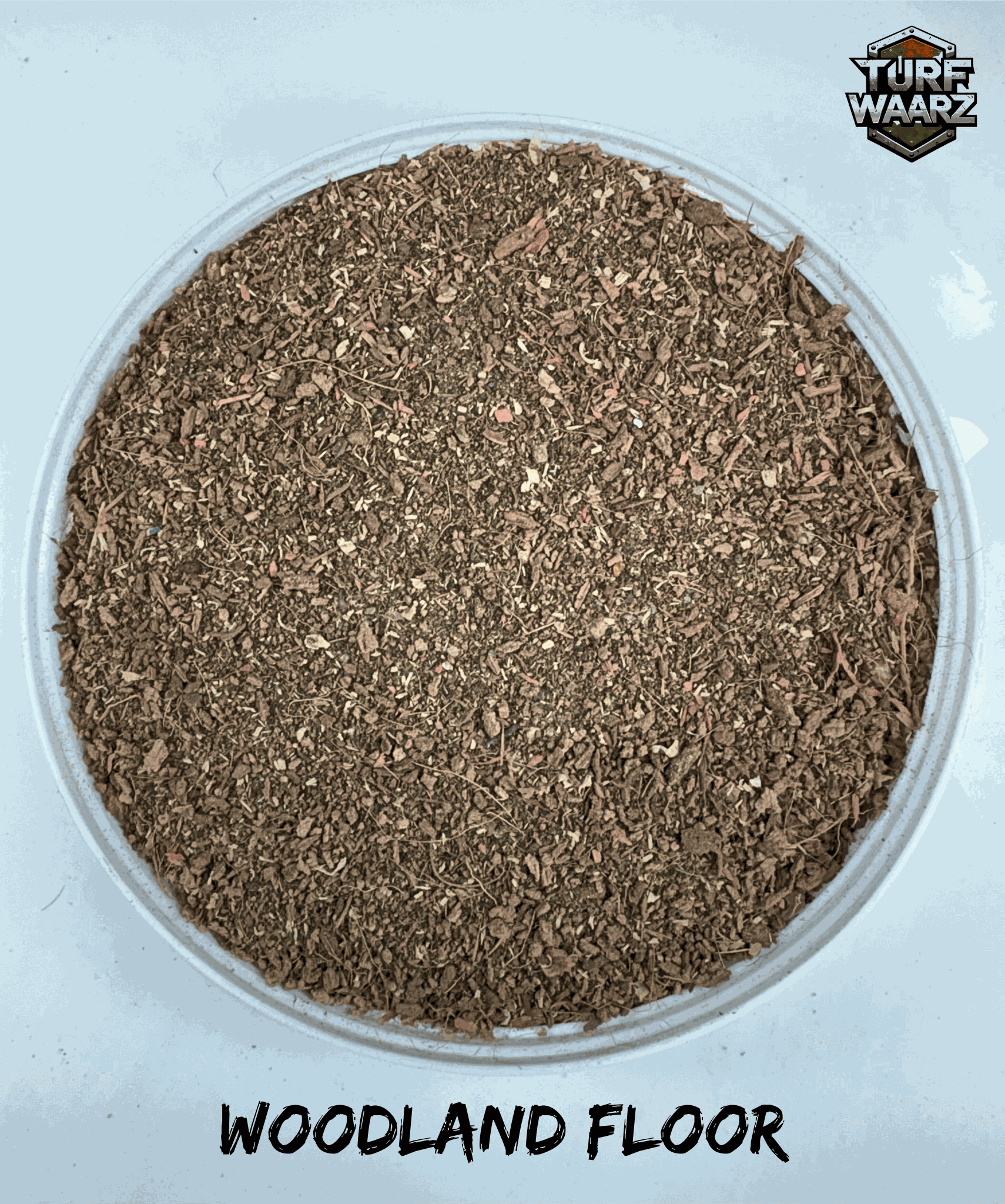 Turf Waarz Woodland Floor Scenics natural gravel and sand mix for realistic woodland terrain modeling and tabletop wargames.