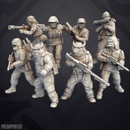 Set of eight 32mm printed resin miniatures of covert raiders with detailed tactical gear and weapons, unpainted and unbased