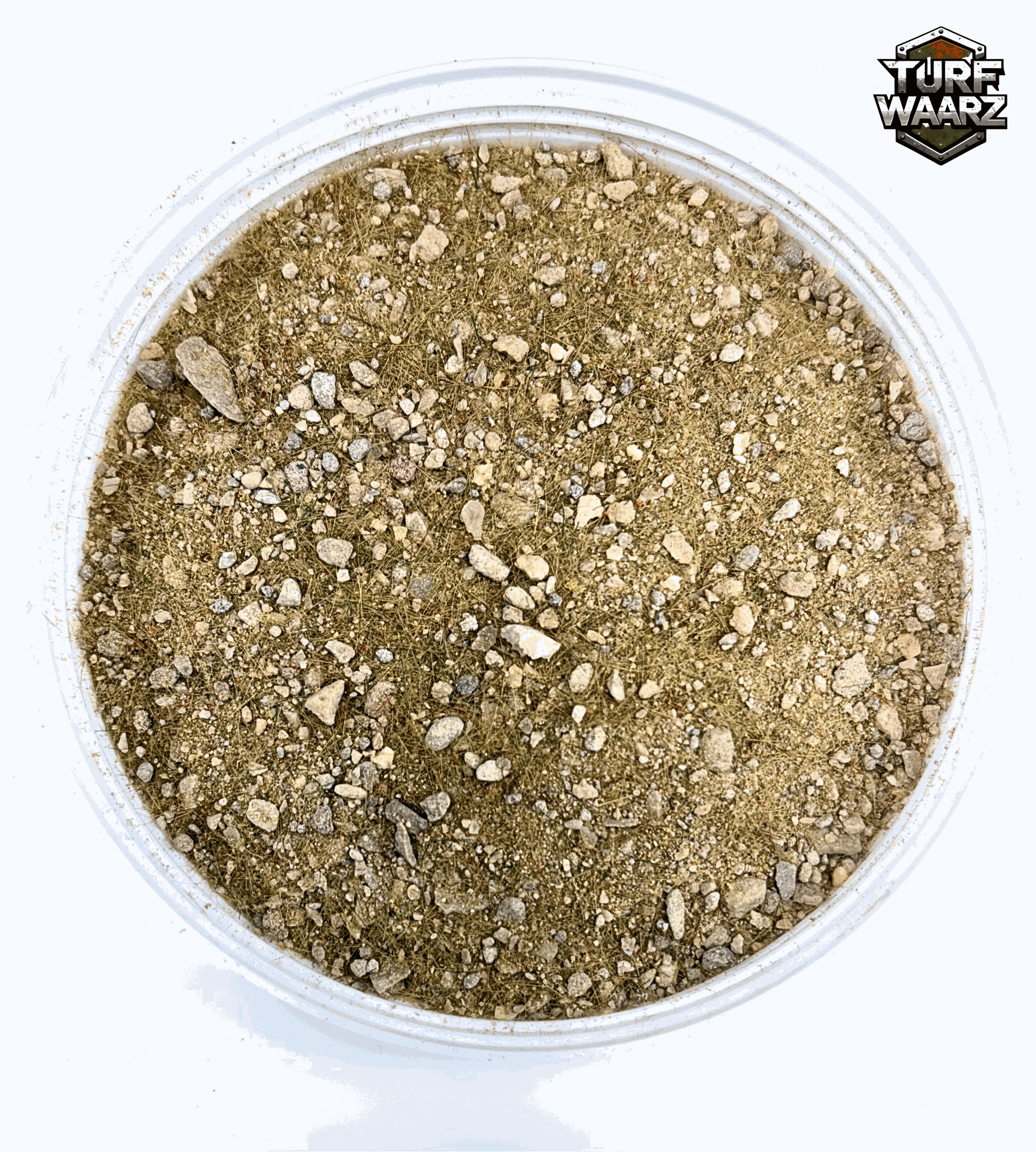 Dead Field Wargame Terrain in a clear plastic container with gravel and sand for miniature and tabletop modeling.