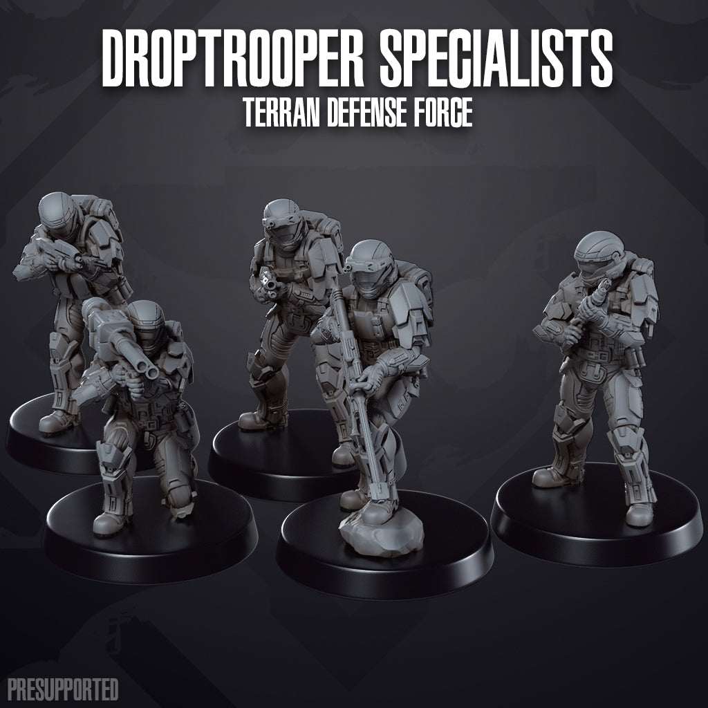 Seven 32mm resin printed Droptrooper Specialists miniatures from Terran Defense Force, unpainted and detailed.