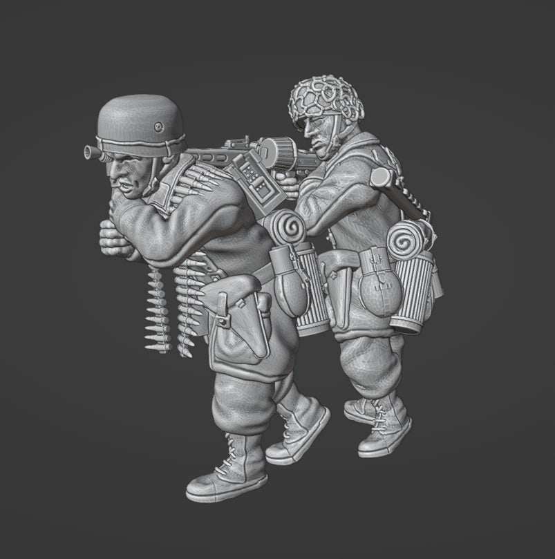 28mm WW2 German Fallschirmjager MG42 team miniature in firing position with gunner aiming and loader holding bipod