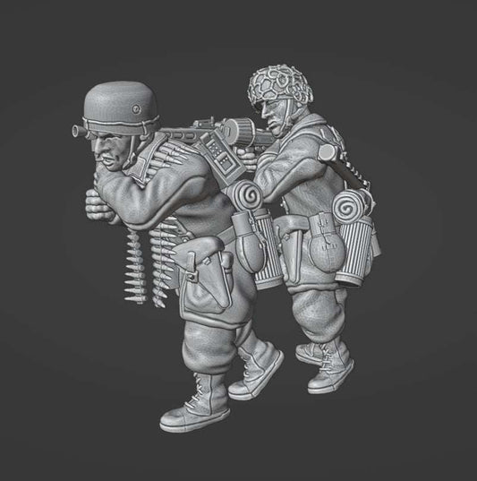 28mm WW2 German Fallschirmjager MG42 team miniature in firing position with gunner aiming and loader holding bipod